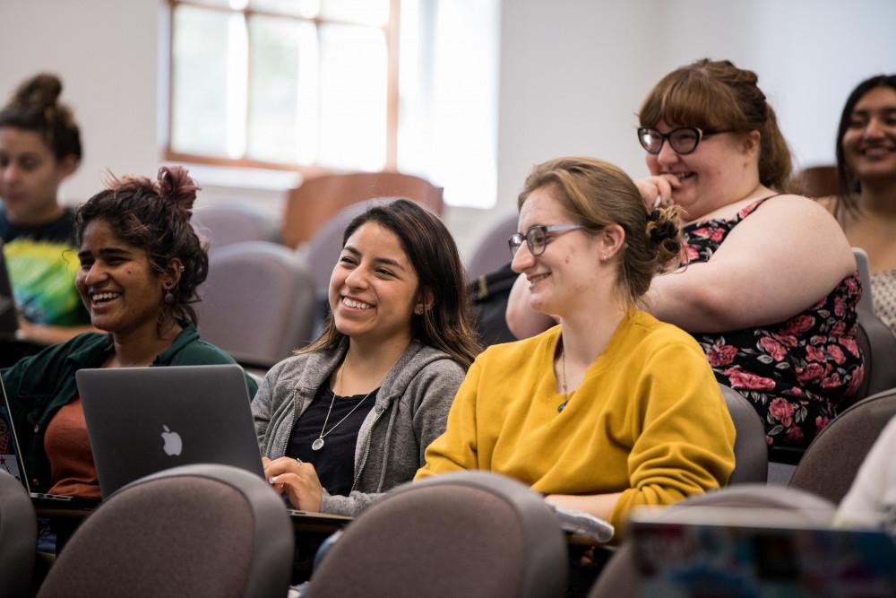 Students attending class in the Richardson Auditorium.